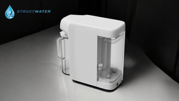 Mini Water reverse osmosis fountain, water filtration device, placed on a black surface.